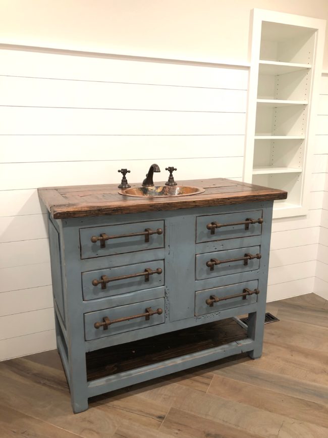 Refurbished dresser for sink with barnwood and copper sink