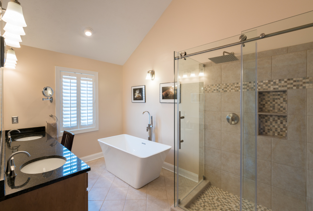 walk-in shower with sliding glass doors